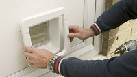 Installing the SureFlap Microchip Pet Door in a door